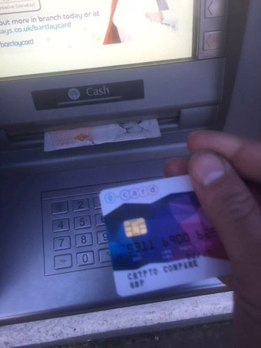 using an atm with a bitcoin debit card