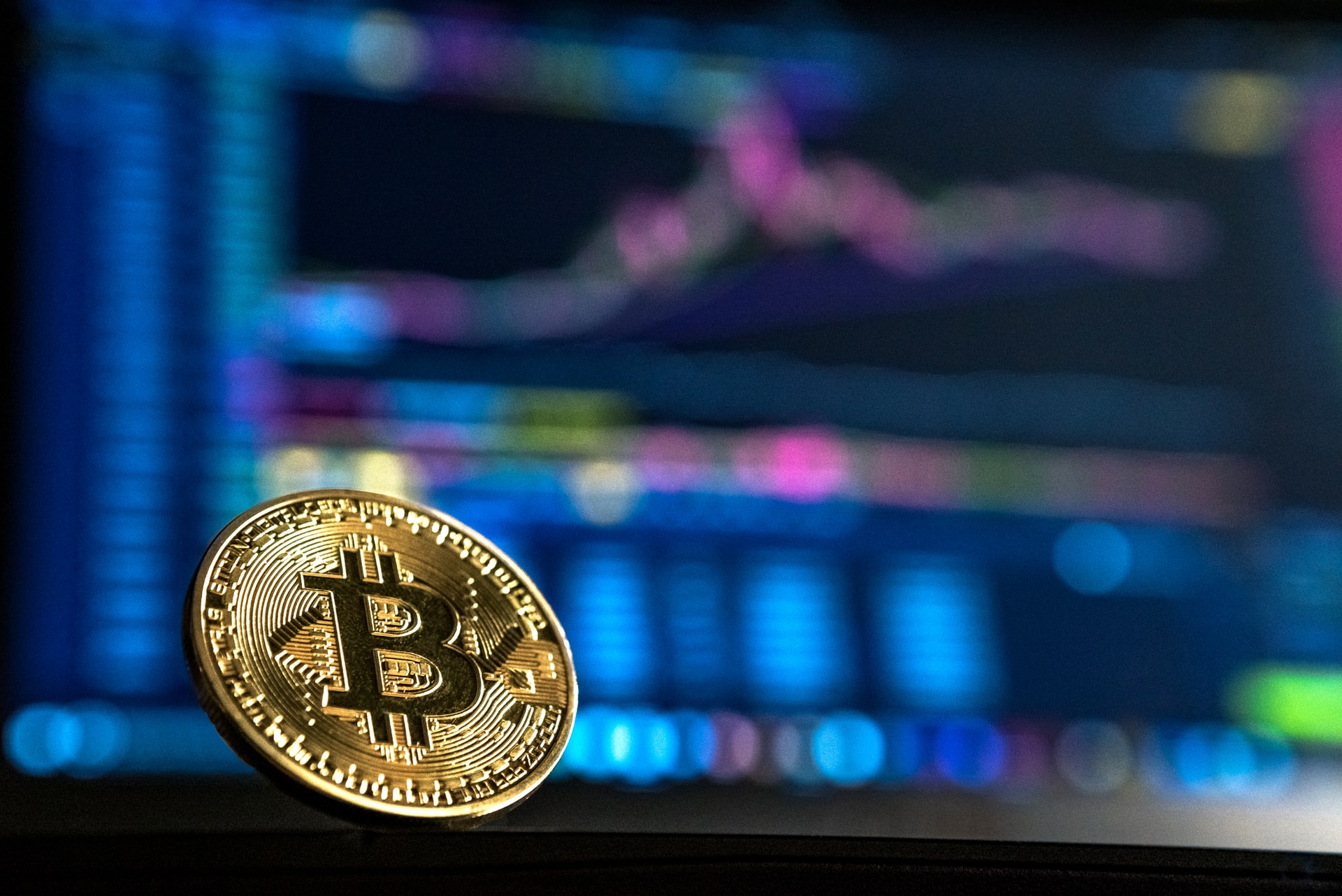 Bitcoin in front of a chart